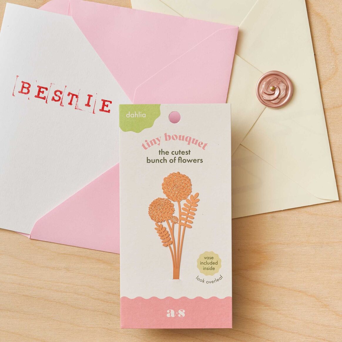 Tiny bouquet featuring a delicate copper dahlia, a unique and elegant design available for purchase from The Petal and Plant Company