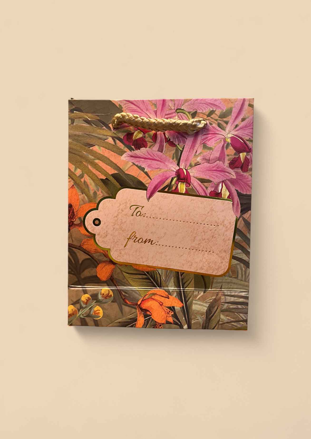 Pink and orange floral-designed gift bag from Powder with  gift label, available as a free addition with a bamboo sock purchase from The Petal and Plant Company