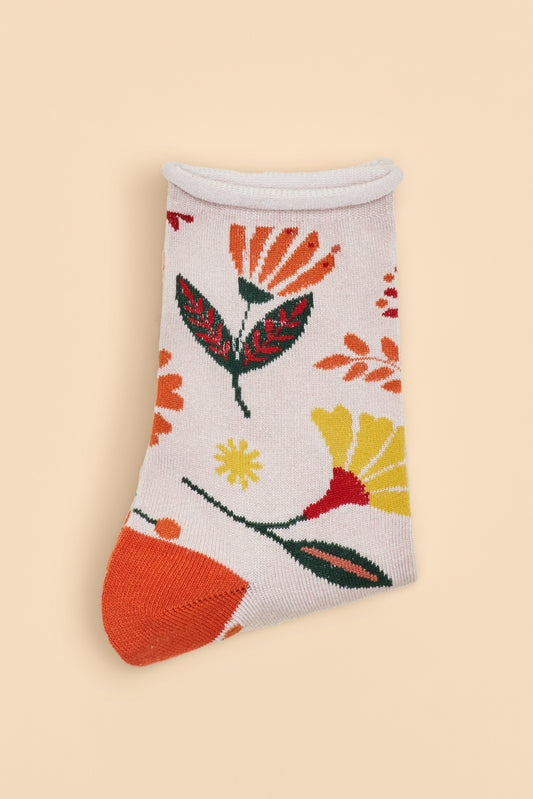 Watercolour Flowers Ankle Socks in cream with orange heels and toes, decorated with an orange, yellow, and green floral design, a perfect gift option from The Petal and Plant Company.