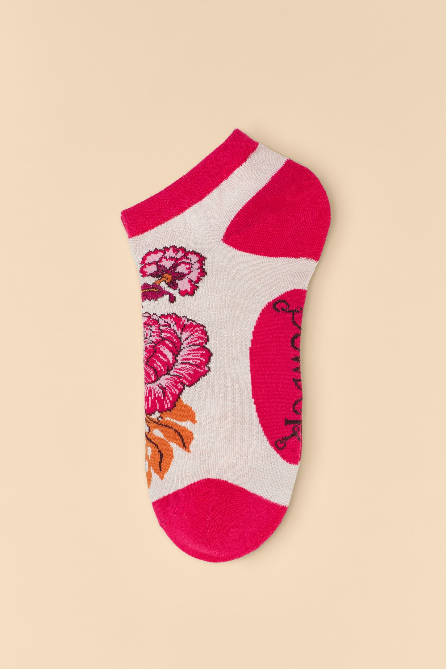 Paisley Floral Trainer Socks in cream with bright pink floral patterns, displayed unworn, a stylish gift available for purchase from The Petal and Plant Company.